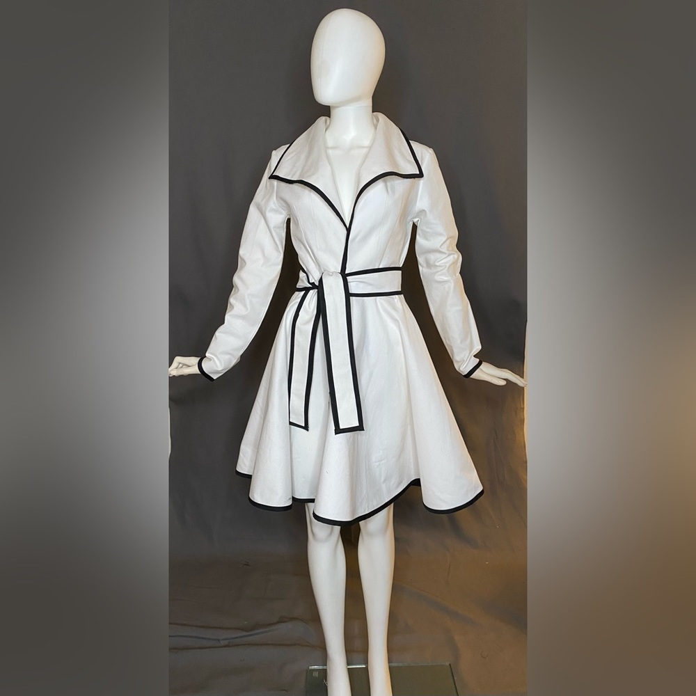White cotton swing coat with black bias edging (28 waist) with tie belt